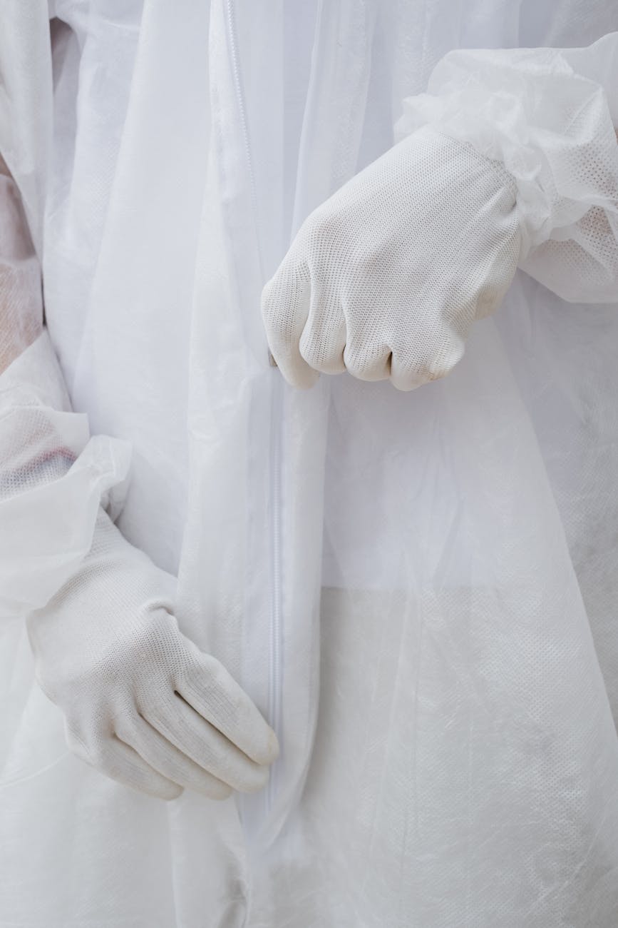 Laboratory technicians wearing hazmat suits illustrating the specialised nature of lab spaces